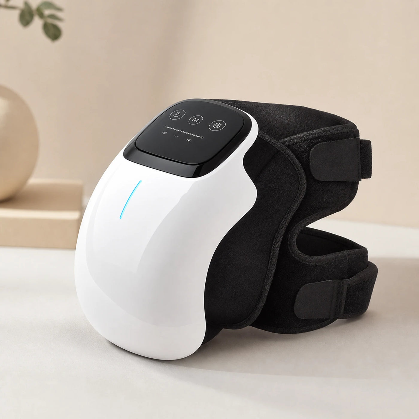 Premium studio image of the Foxiora electric knee massager in clean white